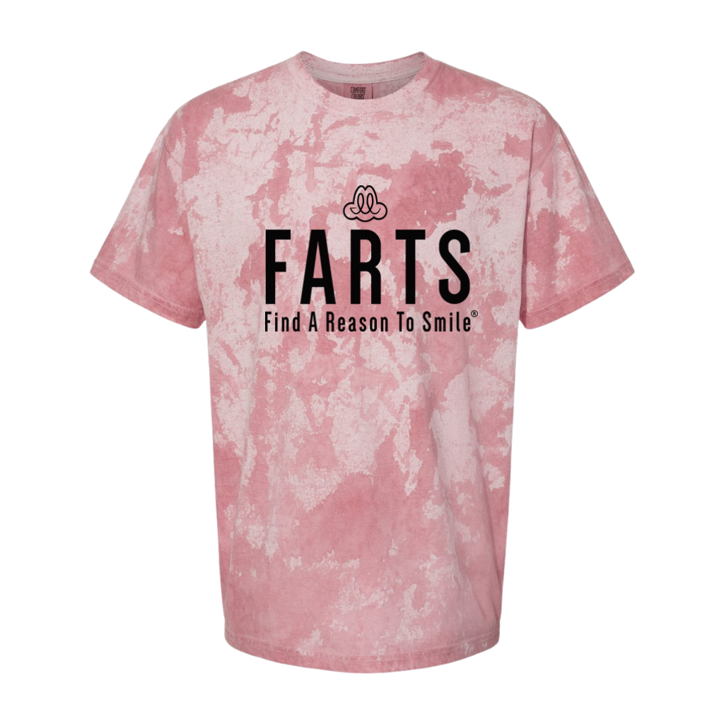 Pink and white tie-dye FARTS shirt with bold uplifting message and spiral design on flat surface