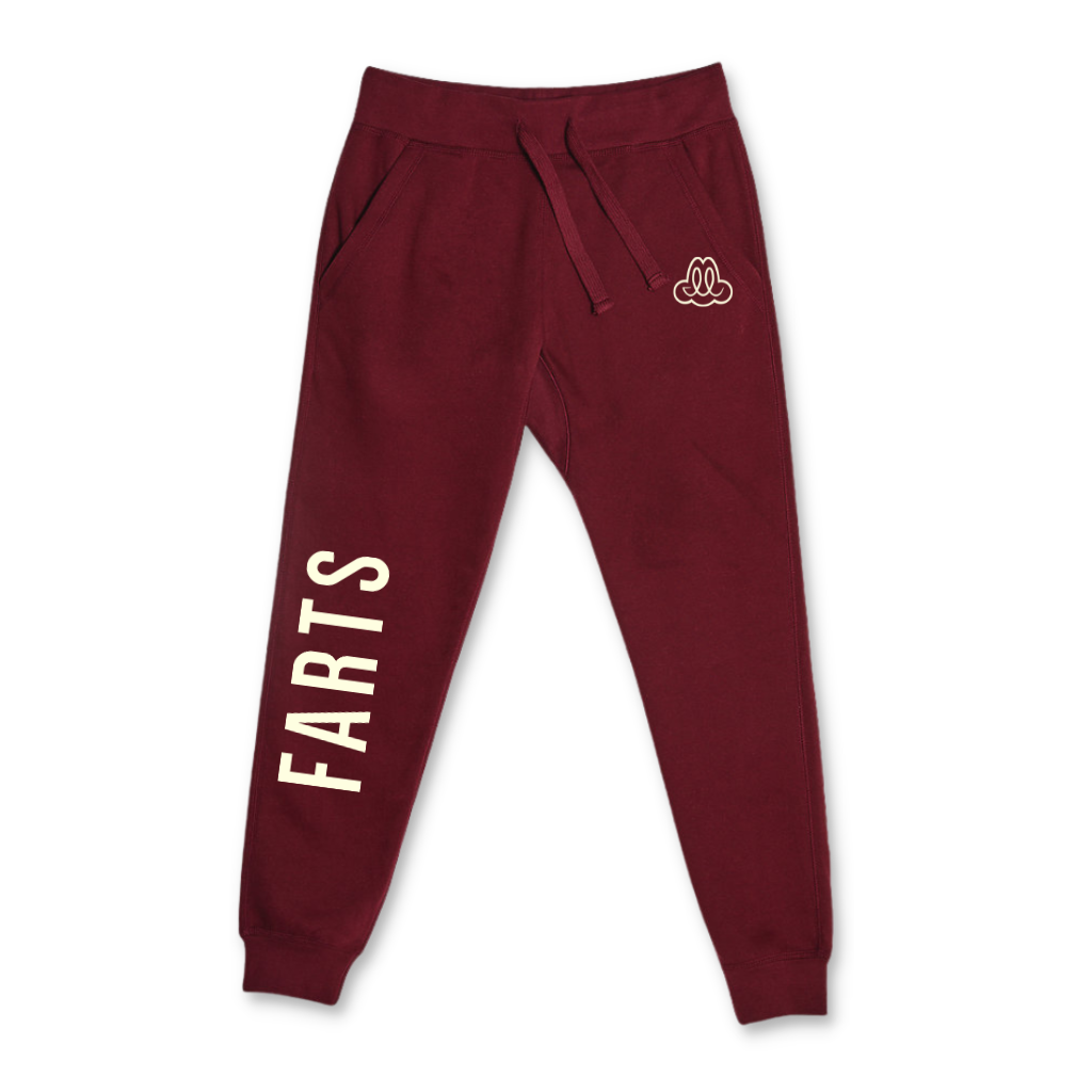 FARTS joggers in burgundy and beige with motivational message, soft unisex fit combining warmth and calm for grounded everyday wear