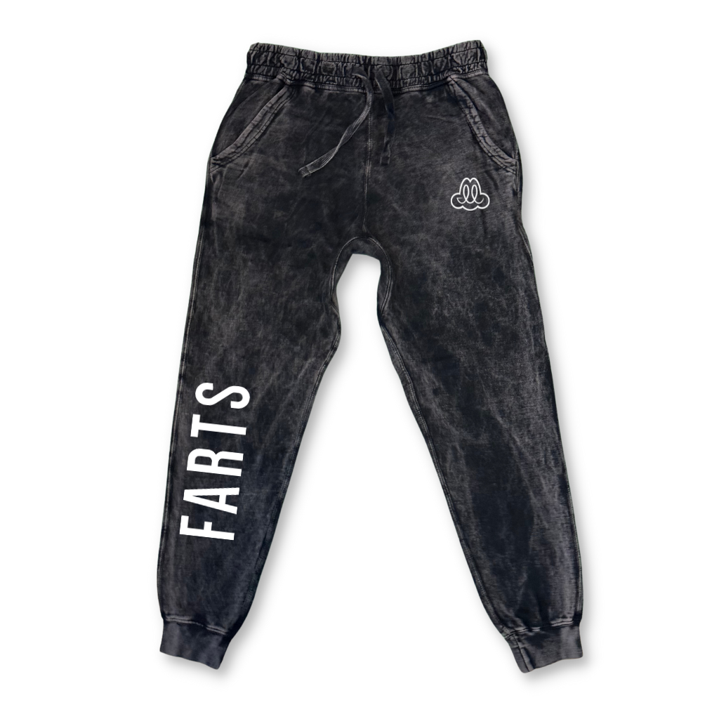 Cloud black FARTS joggers with “Find A Reason To Smile” message, soft mineral wash with fleece comfort and emotional depth