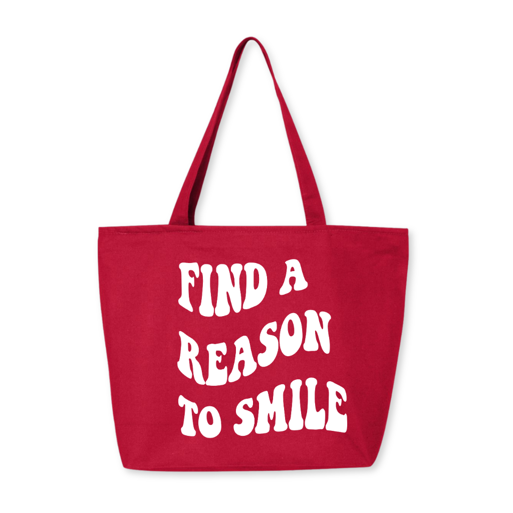 Red zipper tote bag with white groovy “Find A Reason To Smile” message, 27-liter carryall with secure zip-top closure and inside flap pocket