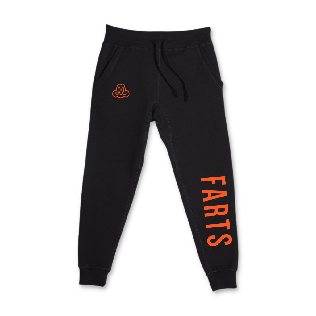Black joggers with bold orange FARTS print unisex mental health loungewear for healing and gratitude