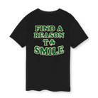 Black t-shirt with St. Patrick's themed text 'Find a reason to smile' on a white background